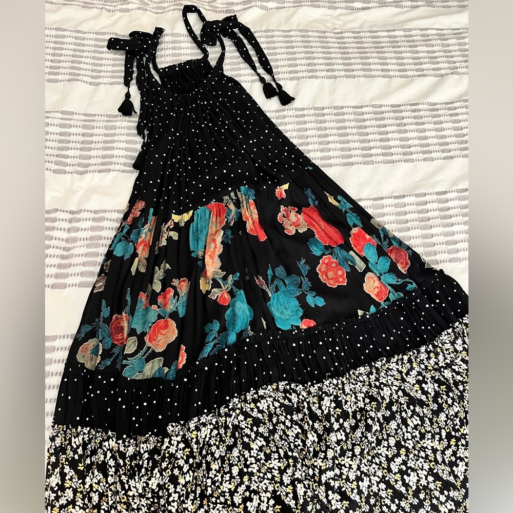 Free People Maxi Dress. Low back, tassels on adjustable shoulder, flowy floral